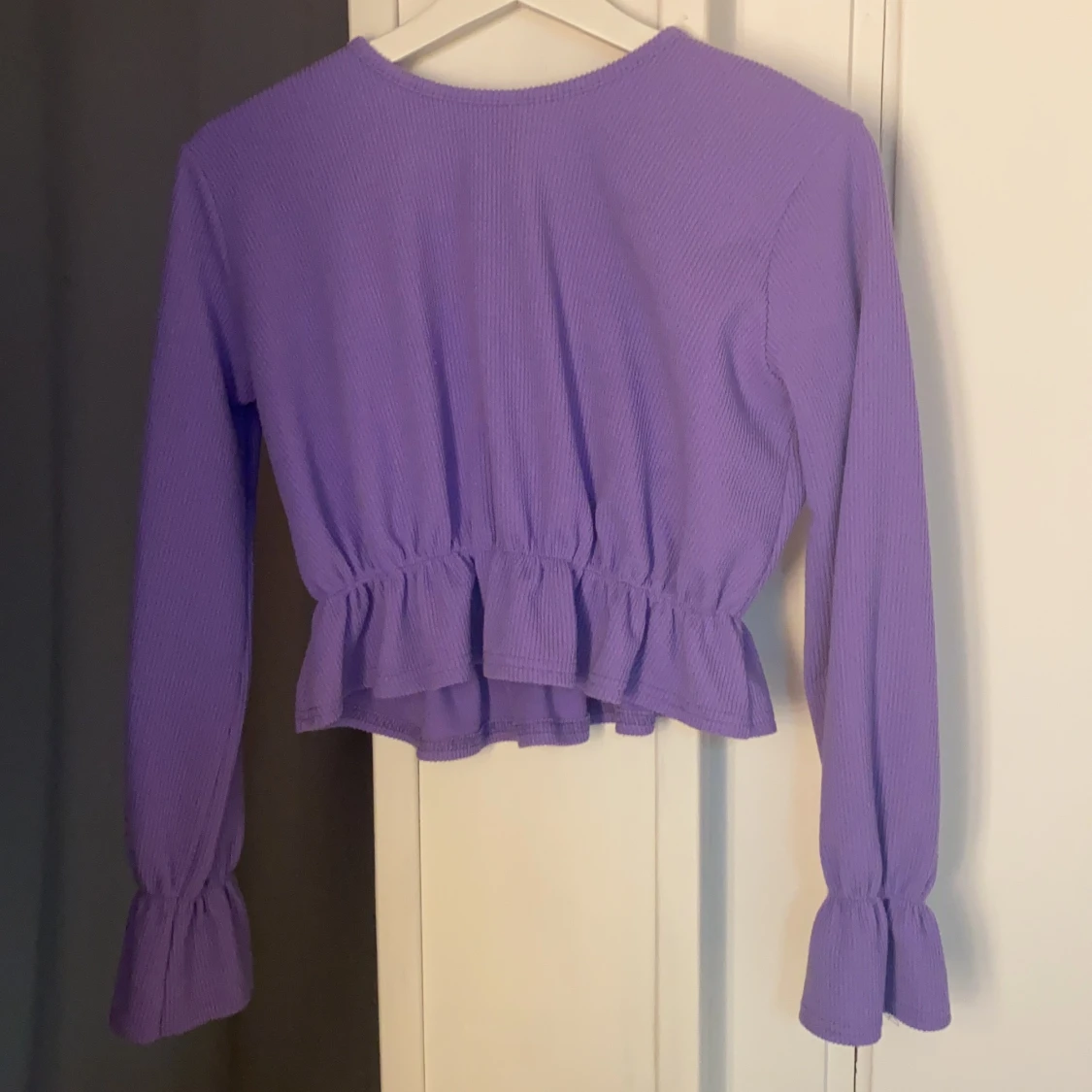 Lila top storlek 38