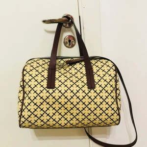 Malene Birger - Stylish bag from By Malene Birger. The bag is made in their iconic Arabic pattern. the bag used a few times !! It's great in the condition.  H:23 cm W:31 cm D19: cm  I have swish, and have more pictures if u need.