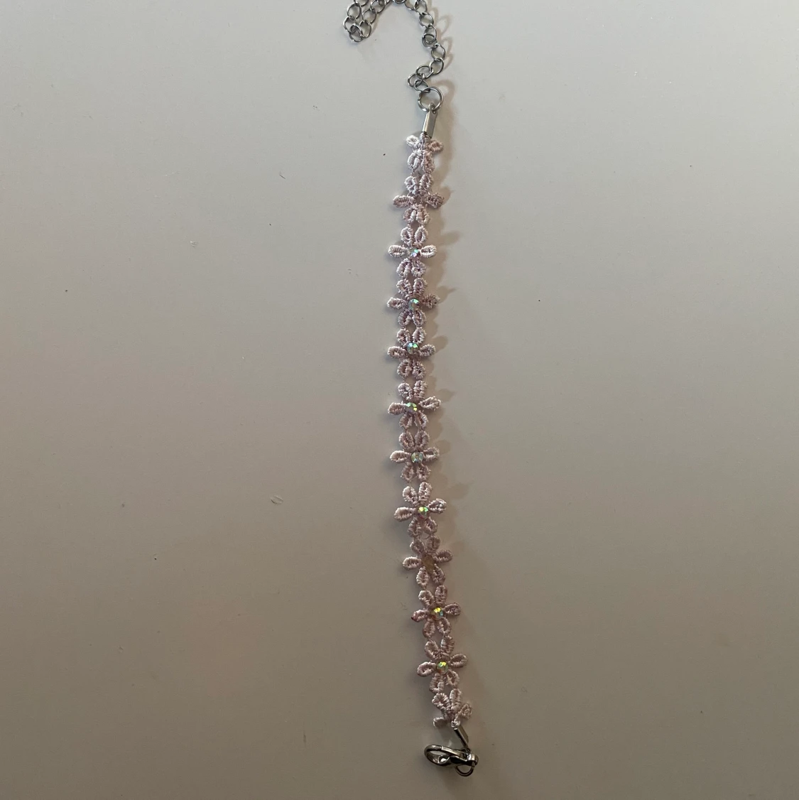 Blommigt armband - 90