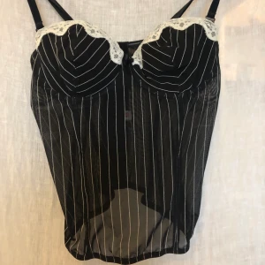Korsett bustier - Stretchigt tyg, går att justera banden.
