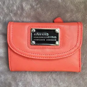 Superfin orange plånbok från Björn Borg i nyskick. 