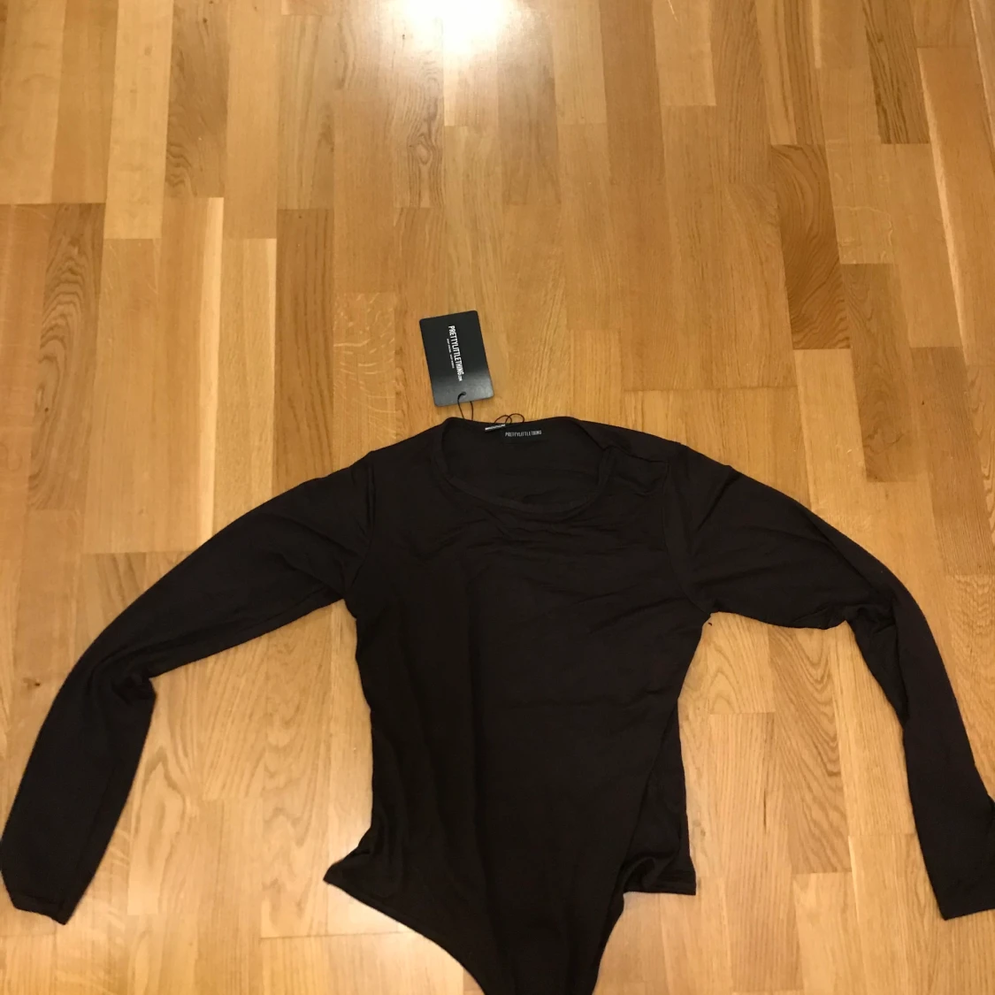 Brand new PLT body suit - 90