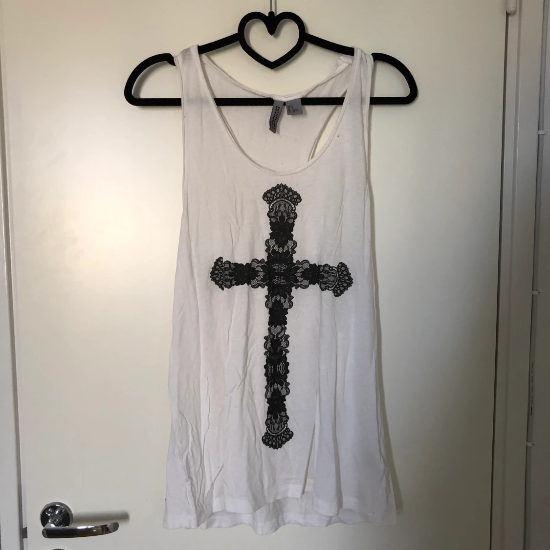 Linne spetskors motiv