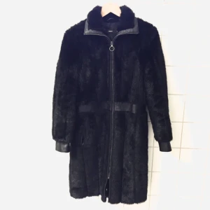  - An awesome winter delight of a coat. Totally vegan in faux fur and high quality artificial leather, you can look sassy AND be animal cruel free! From the high end Swedish brand Filippa K.