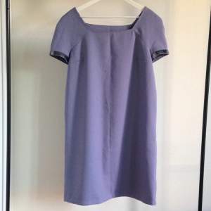 Lilac free-cut dress made by me. Short sleeves with decoration.