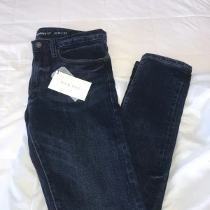  - Ett par helt oanvända Pier One jeans Slim tapered fit