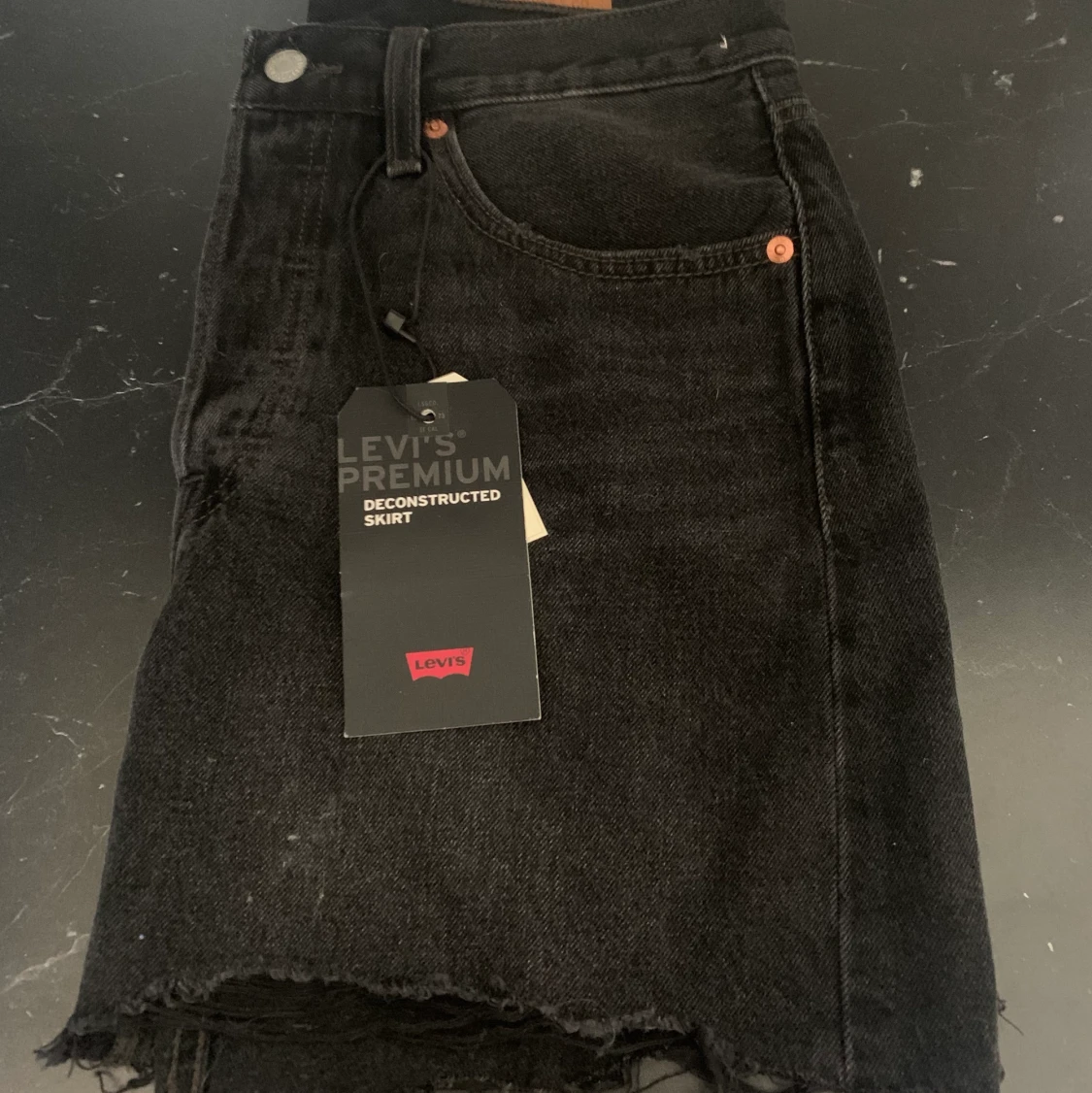 Levis jeanskjol storlek 28