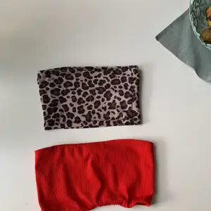 2 tubtoppar som säljs tillsammans. Den ena röda i storlek S är från Gina och den i leopard storlek Xs från Pull&bear. Frakt ingår ej 