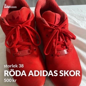 Adidas sko - Röda adidasskor. Använda några gånger så finns några små fläckar, går att tvätta bort. 