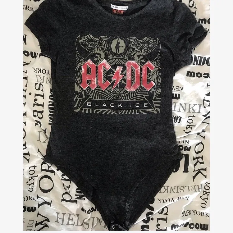 Really nice quality AC/DC Black Ice body shirt. Used only two times. Very slim fit so even though it says size S, for me it was a little bit too tight but still wearable.. Skjortor.