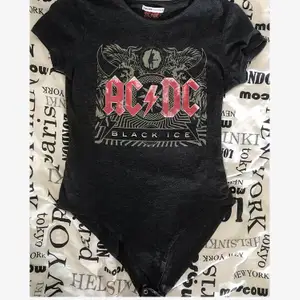Really nice quality AC/DC Black Ice body shirt. Used only two times. Very slim fit so even though it says size S, for me it was a little bit too tight but still wearable.