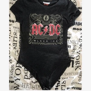 AC/DC body shirt - Really nice quality AC/DC Black Ice body shirt. Used only two times. Very slim fit so even though it says size S, for me it was a little bit too tight but still wearable.