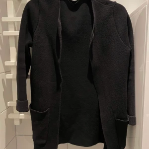 Skickad kappa - Enkel stickad kappa