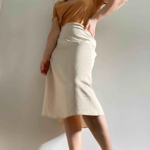  - Gorgeous satin midi skirt (not see through) cream colored.