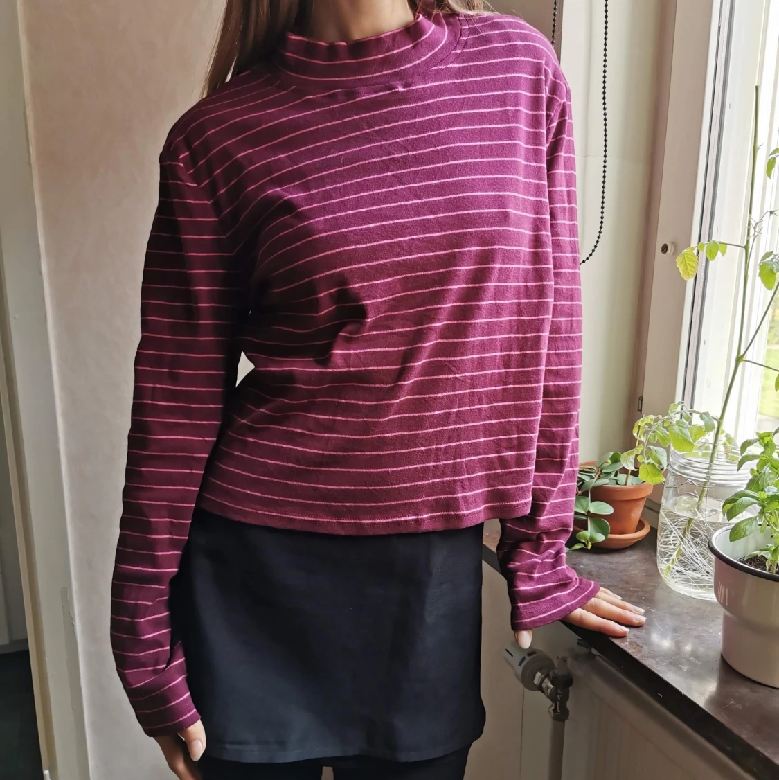 Rosa randig polotröja