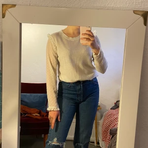 H&M white blouse ,size M - White blouse with with sheer polka dot sleeves and small buttons on sleeves. Size M ,good condition. 69% acrylic,25% viscose, 6% polyamide 