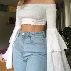 Na-kd topp - Fin somrig topp från Na-Kd med ”änglavingar” jag har vanligtvis storlek S på tröjor. säljer den för 150kr