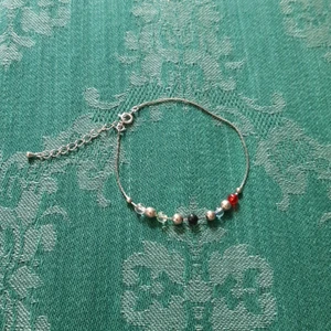 Fotlänk - Silvrig fotlänk med pärlor. 20 kr inklusive frakt