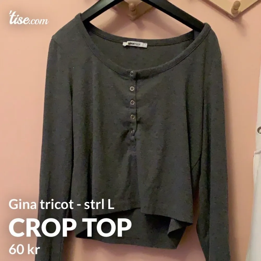 En grå croptop från gina tricot i storlek L, passar även någon med storlek M. Pris kan diskuteras. Toppar.