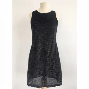  - Den lilla svarta med en glittrig twist.

Märke: CCDK
Storlek: 38
Skick: Mycket gott. Aldrig använd.

Pris: 75 kronor

Frakt: Betalas av köparen.