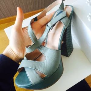  - High heels from 5th Avenue, real leather. Comfy, despite the height, used couple of times inside (little bit small for me). More for not very wide foot 