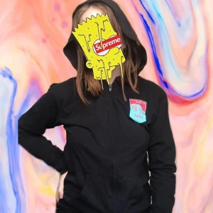 Surf hoodie size S - Black stretchy zip hoodie with surf/coffee logo on chest. 