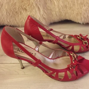  - Red shoes in a very good condition