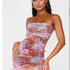 Klänning - Storlek XS. Helt oanvänd. Lappar kvar