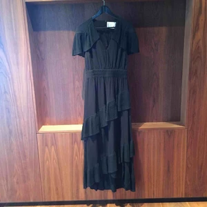  - One time used maxi dress.  Super beautiful. A cut out on backside. 