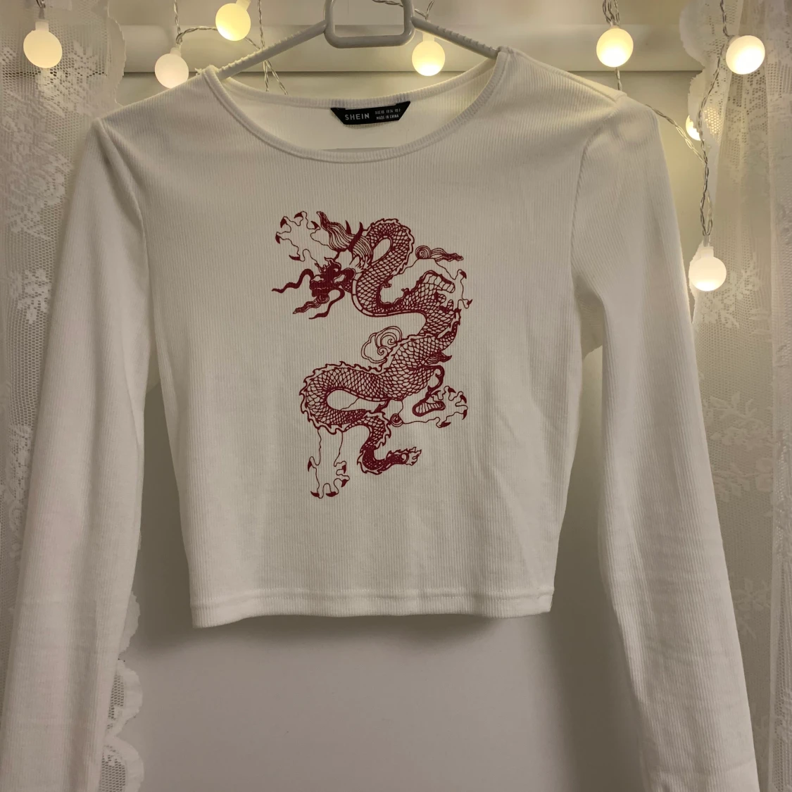 Drakmönstrad tröja från SHEIN 