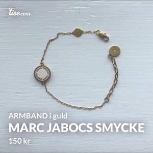 Marc Jacobs armband i guldfärg du och vit 