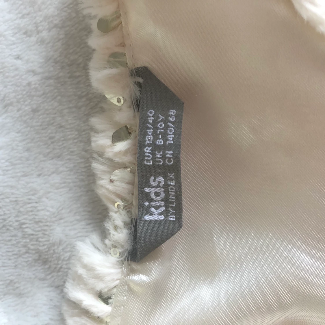 Vit väst med paljetter från lindex - 91