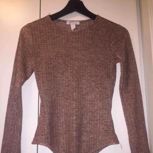  - Väldigt fin body ifrån Nelly, använt få gånger. Frakt tillkommer!