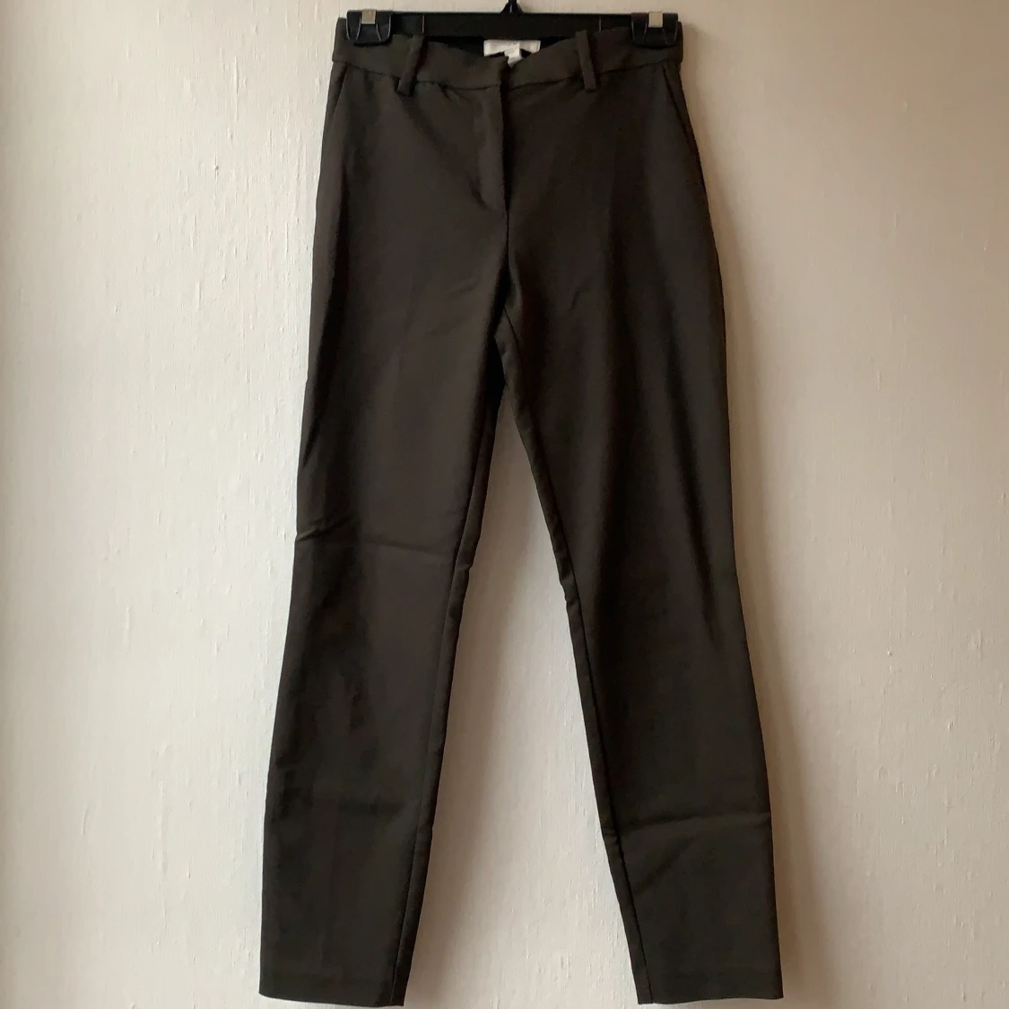 Mörk gröna kostymbyxor 