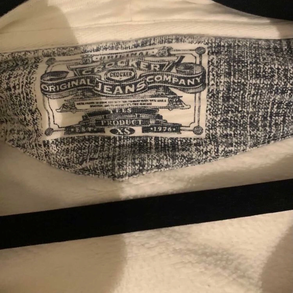 En vit kofta för 75kr - 90