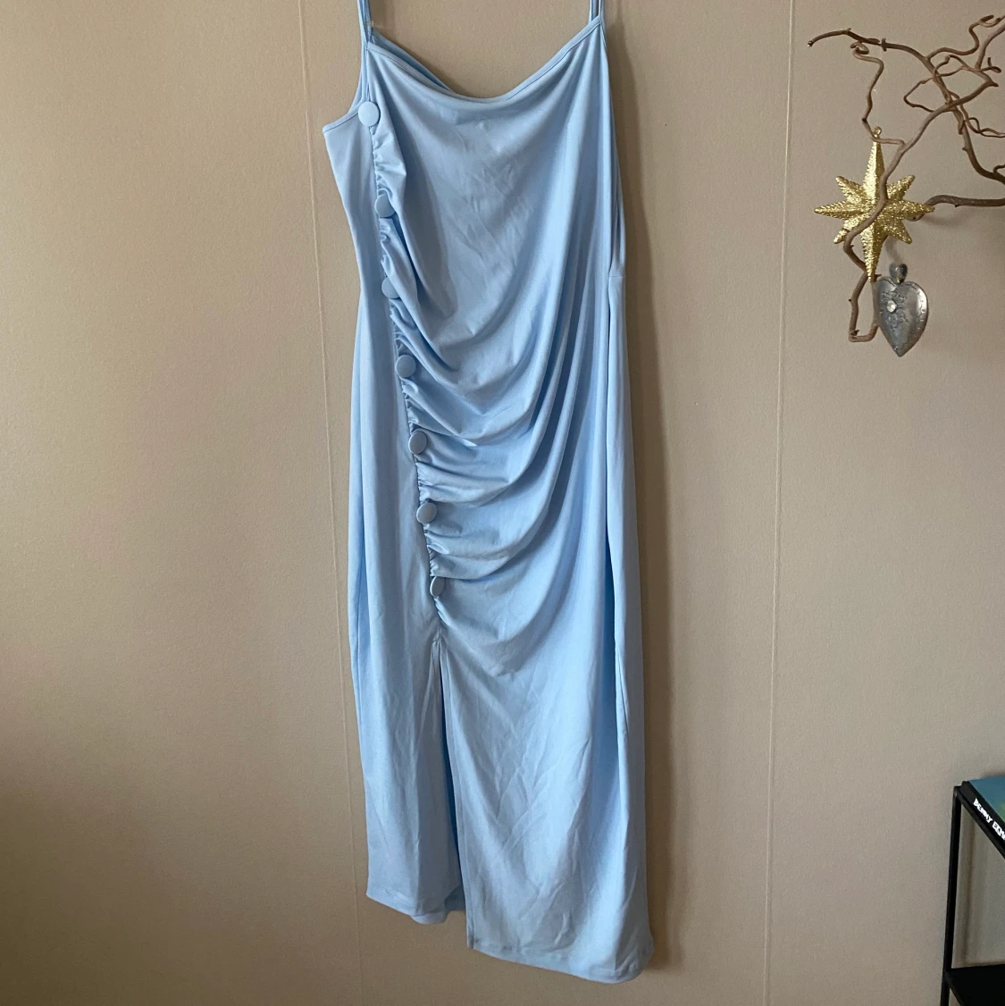 En oanvänd klänning ifrån ASOS strl 46