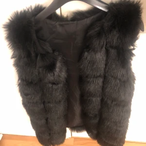 Pälsväst - Använd få tala gånger 