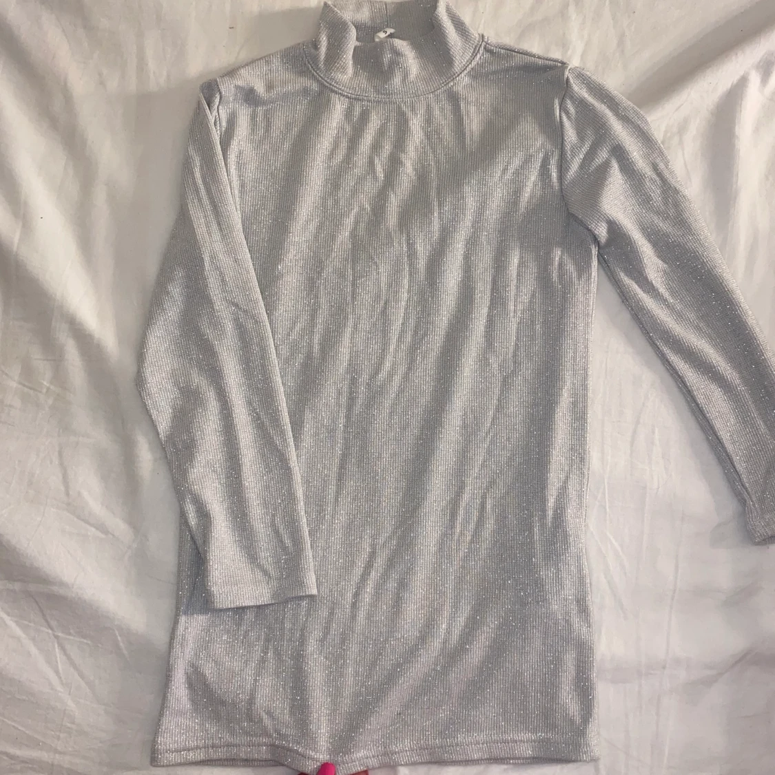 Glittrig tröja stl. S - 90