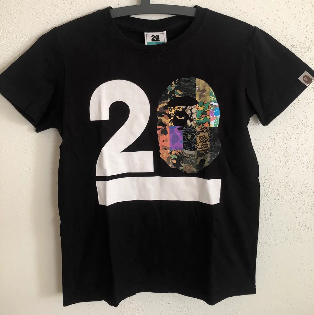 Women’s Bape / A Bathing Ape 20th Anniversary T-Shirt  Size small, women’s fit.  Great condition, no flaws or damage.  DM if you need exact size measurements.   Buyer pays for all shipping costs. All items sent with tracking number.   No swaps, no trades, no offers.. T-shirts.