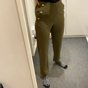 Green trousers with golden garments  - New with tag, now on shops. Militar green. Golden buttons