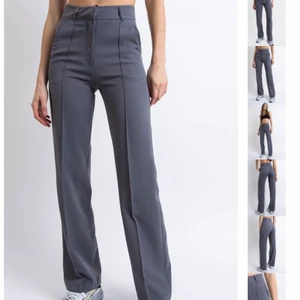 Gråa kostymbyxor - Oanvända med lappar kvar från madlady. Passar mig som har 38 annars men är en 40 L32 och jag är 168 cm lång 