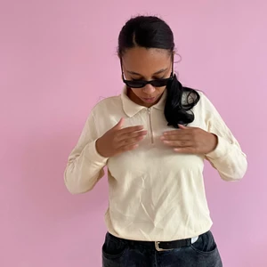 Pastel yellow polo - Long sleeved polo with a zipper