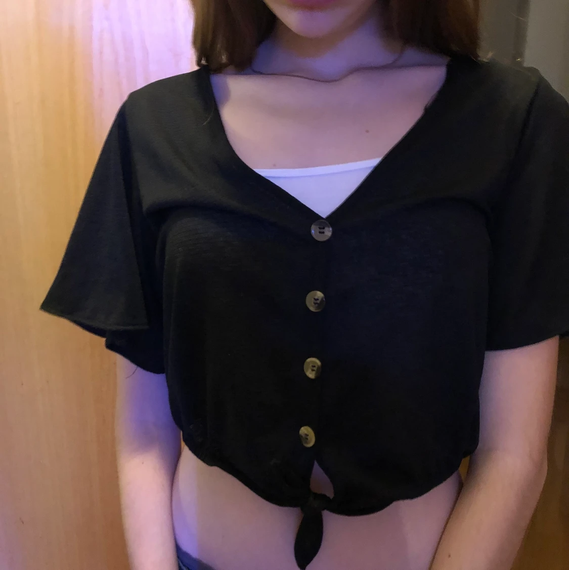 Svart blus med knappar