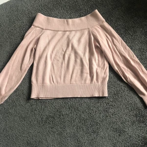  Stickad  Tröja - En stickad tröja, rosa, fint skick