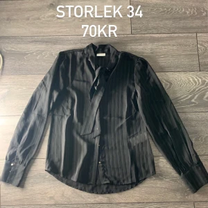 skjorta - storlek 34