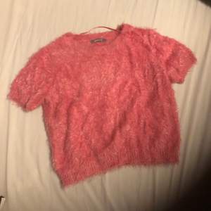 Mysigaste rosa fluff-t-shirten