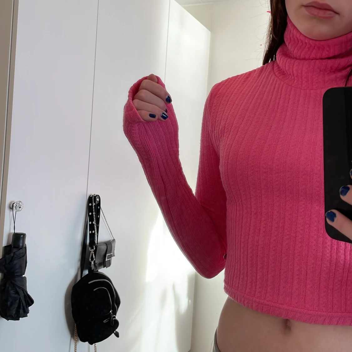 En rosa tröja med polo - 90