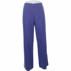 Blåa linnebyxor - Supersnygga blå/lila linnebyxor. Vintage och sitter lågmidjat och lite fint oversized på mig som brukar va s/m!