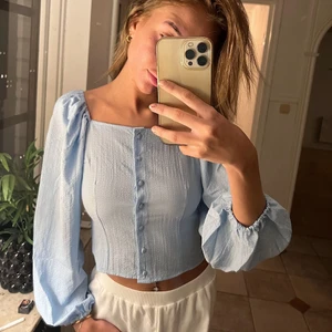 Topp - Festligare topp i storlek S.