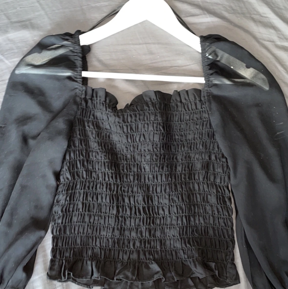 Svart blus divided, storlek eu 36